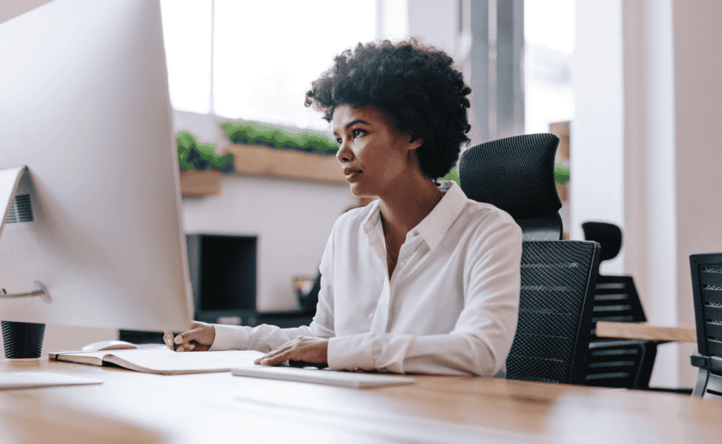 Woman working at computer.