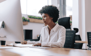 Woman working at computer.