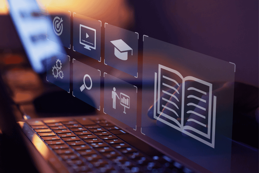 Computer screen with icons overlayed, such as a book, search icon, and graduation cap.
