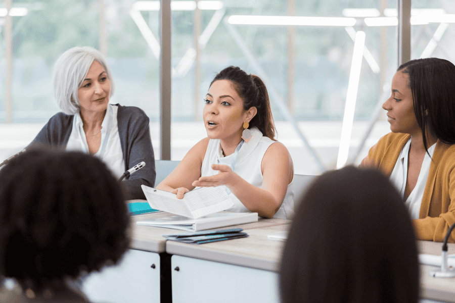 Woman speaking at a meeting