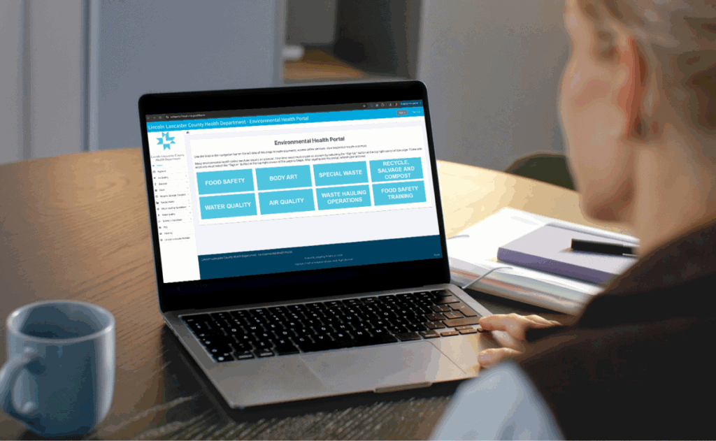 Person at a computer looking at an Environmental Public Health Portal.