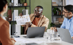 Man presenting business report during professional meeting