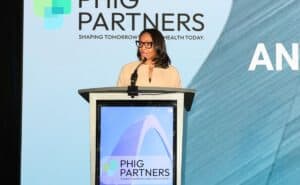 CDC's Ursula Phoenix Weir delivers opening remarks at an event.