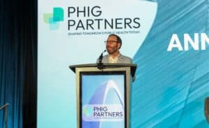 Dr. Joe Kanter delivers opening remarks during an event.