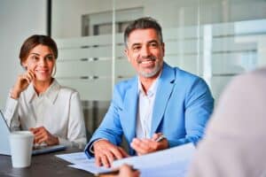 Two business professionals in a meeting.