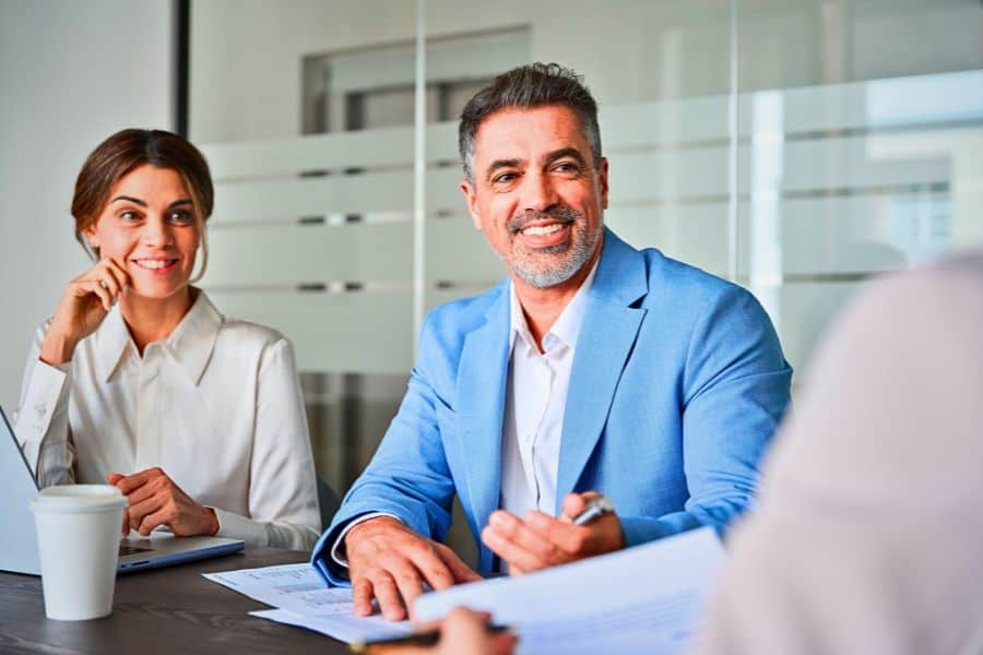 Two business professionals in a meeting.