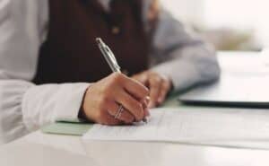 Close up of a hand writing.