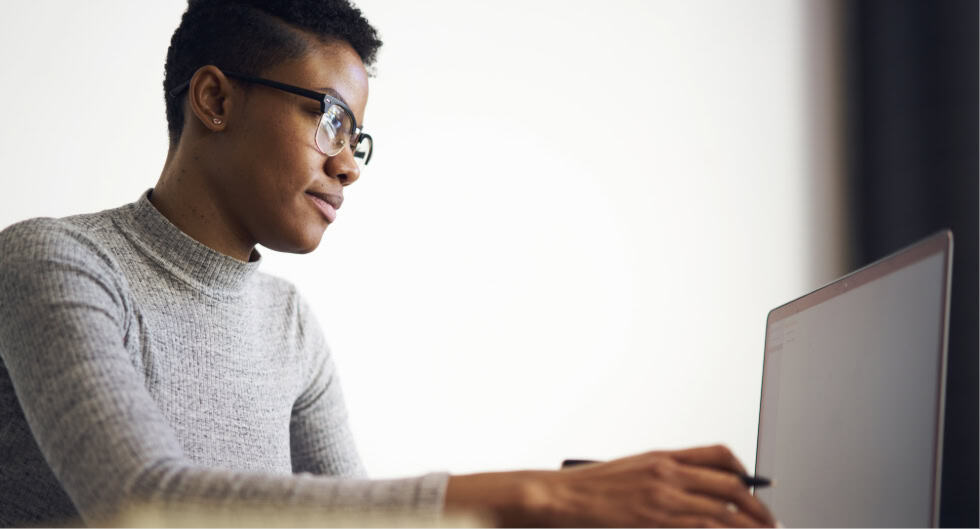 Man typing at a computer